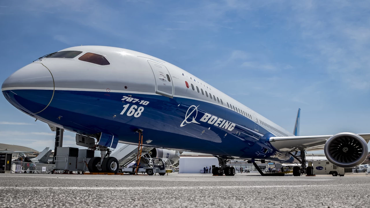Boeing suffers loss as Dreamliner flaws inflate costs, but airplane sales up