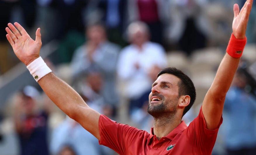 Djokovic into French Open quarter-finals after five-set thriller