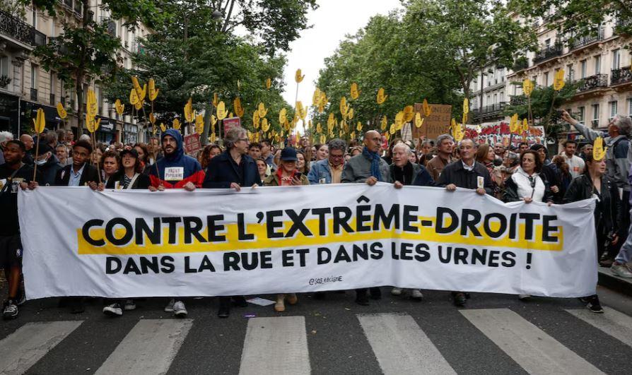 Thousands march in France in pre-election protest against far right