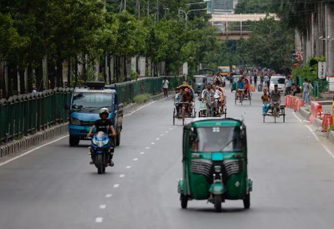 Bangladesh factories, banks reopen as curfew is eased after protests taper off