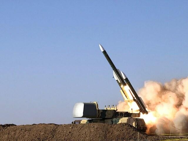 Iran fires missiles during drills in warning to Israel