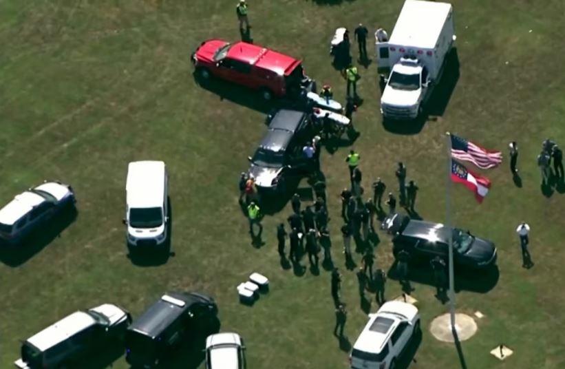 Shooting in Georgia high school leaves 4 dead, one person in custody, authorities say