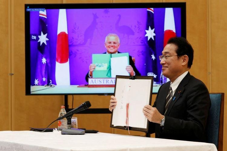 Australia, Japan sign bilateral defense treaty