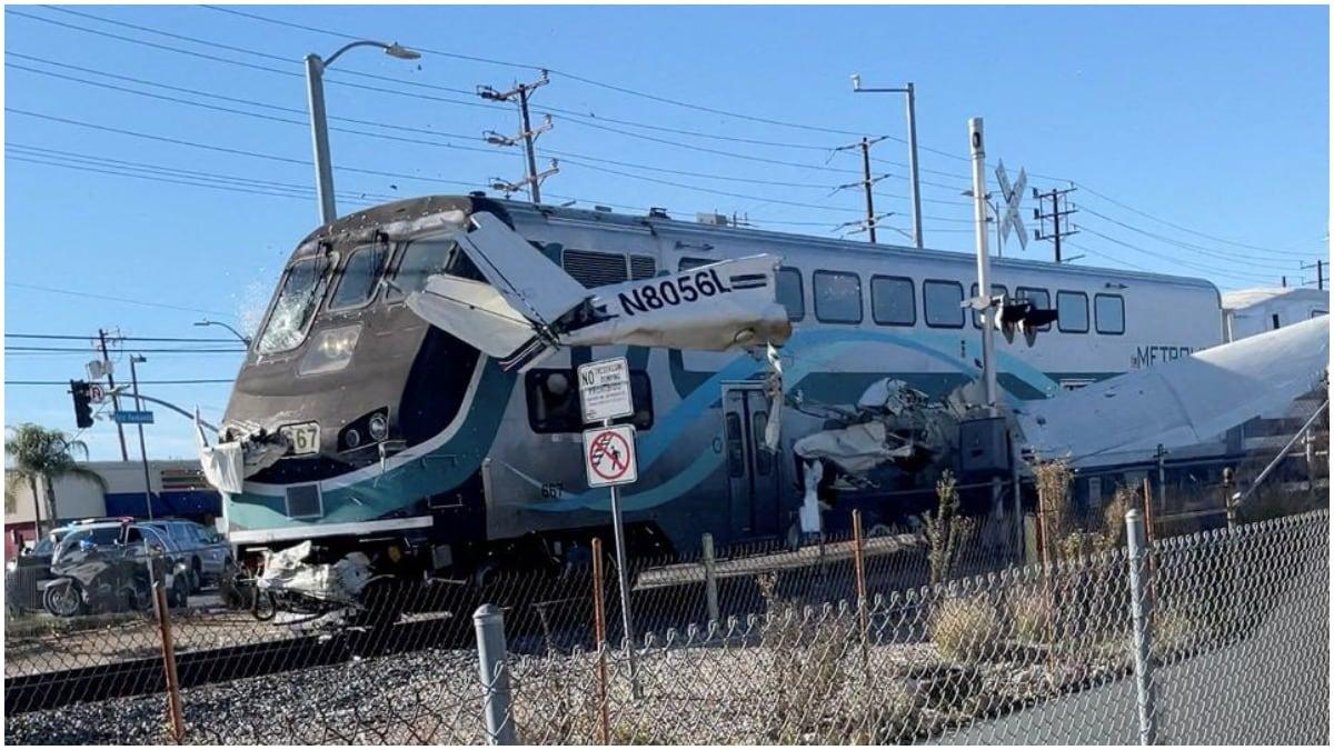 Video: Train hits crashed plane seconds after pilot rescued 