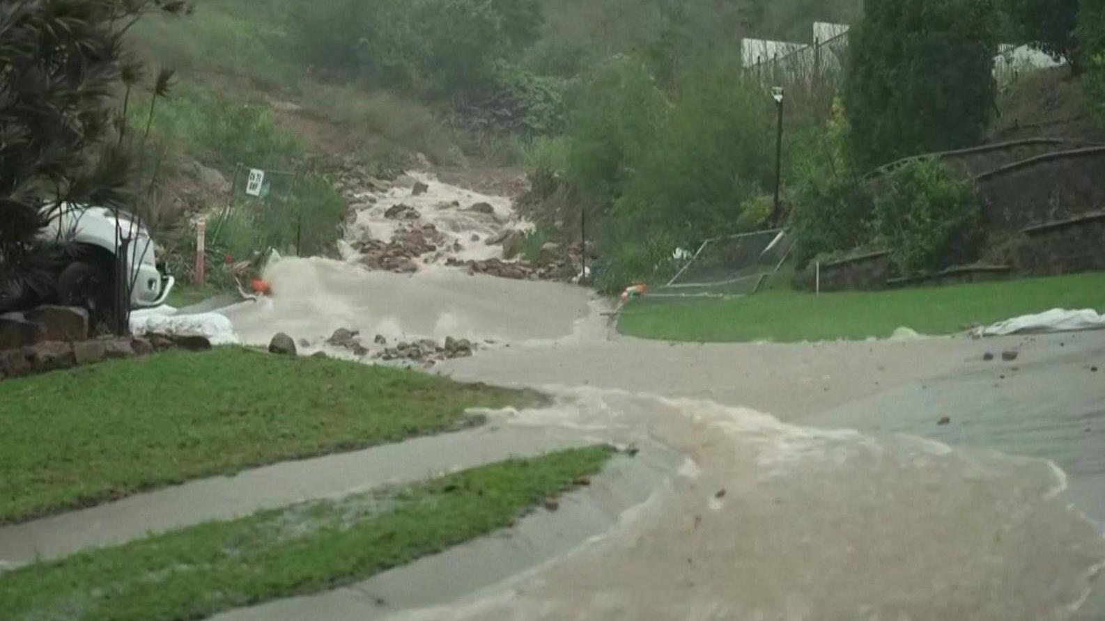 One dead as flooding hits Queensland amid heavy rains