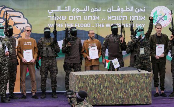 Hamas frees three hostages, Israel begins releasing Palestinians