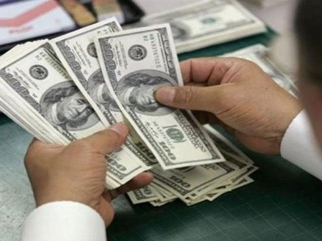 Dollar drops in interbank market, rises in open market amid IMF mission review