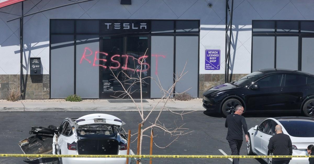 US attorney general re-announces ‘severe’ charges against alleged Tesla arsonists