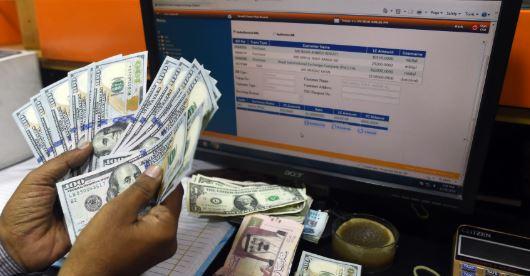 Rupee under pressure as dollar hits Rs284.40 in open market