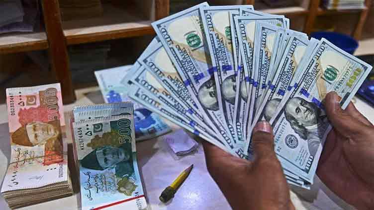 Rupee slightly weakens against dollar in interbank gains in open market