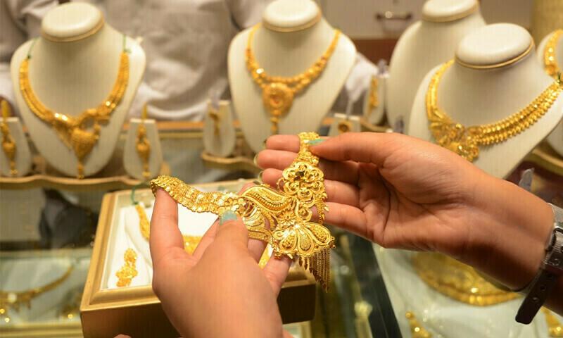 Gold prices climb slightly amid global uptick