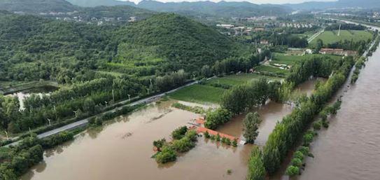 Over 30 dead, 80,000 evacuated as torrential rains hit northern China