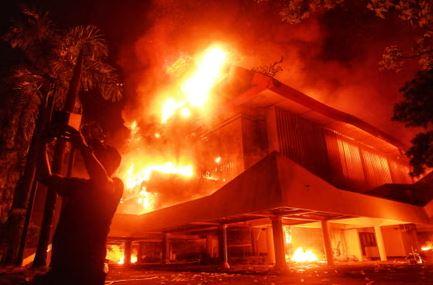 Three dead as protesters set fire to council building in Indonesia
