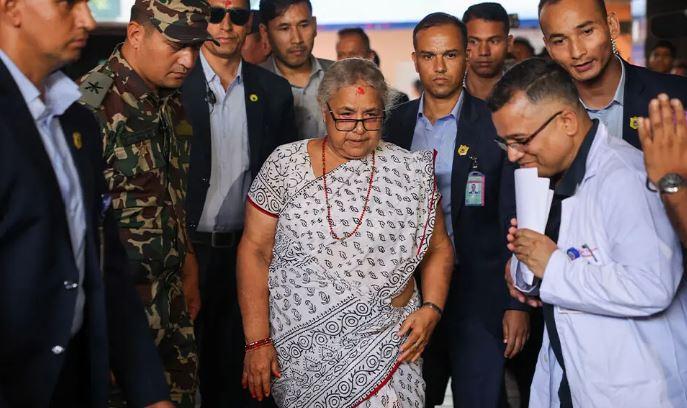 Nepal returns to calm as first woman PM takes charge, visits wounded