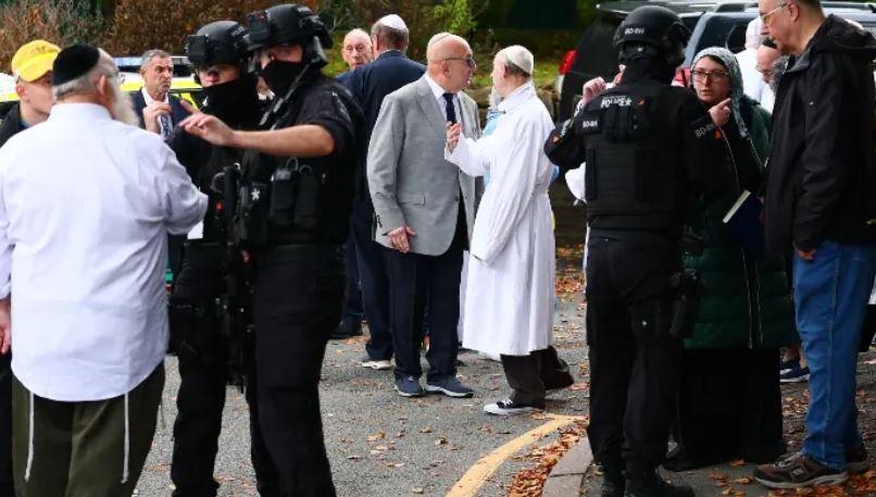 Four injured, suspect shot in Manchester synagogue attack