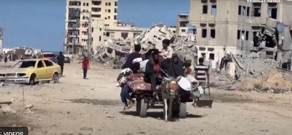 Palestinians return to devastated Gaza City as truce holds