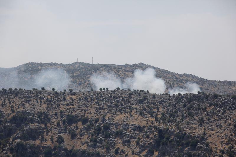 Hezbollah fires barrage of rockets after Israeli airstrikes