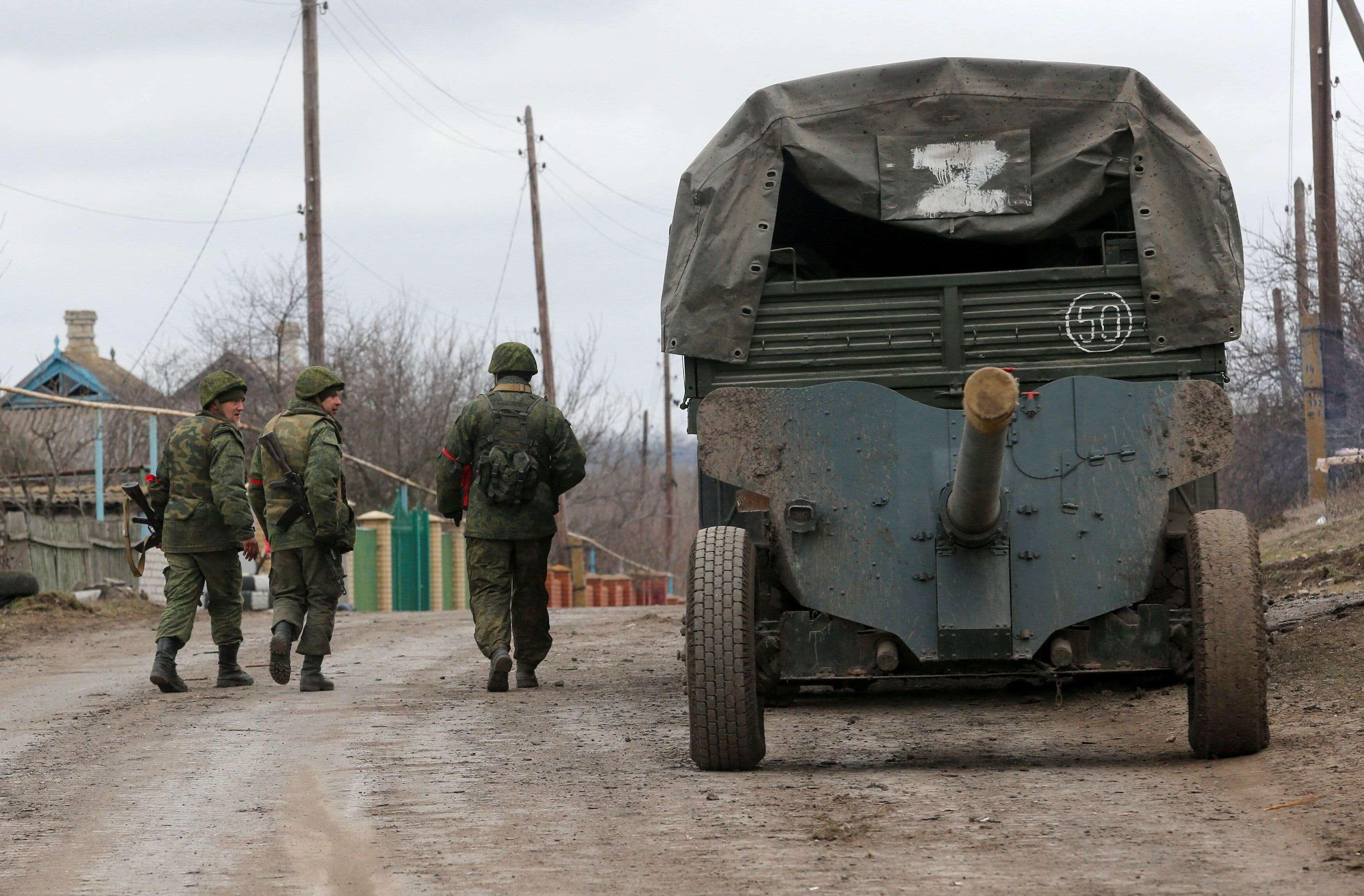 Russian forces surround two key cities in southern Ukraine