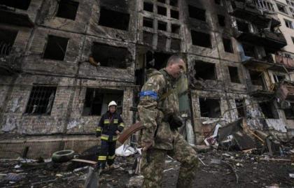 Russian forces press in on Kyiv as curfew begins