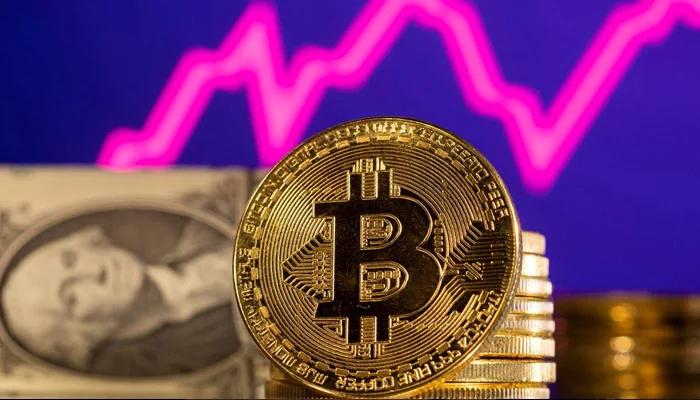 Bitcoin holds ground after touching highest this year