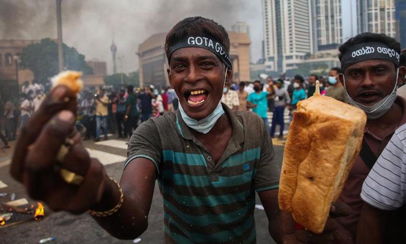 سری لنکا  میں معاشی بحران: ڈیفالٹ سے بچنے کے لیے قرضوں کی ادائیگیاں معطل