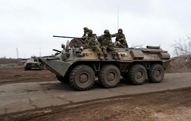 Hundreds of Ukraine marines surrender in key port of Mariupol, says Russia