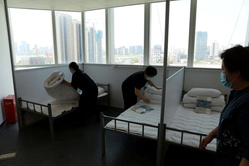 Shanghai turns residences into COVID isolation facilities, sparking protest