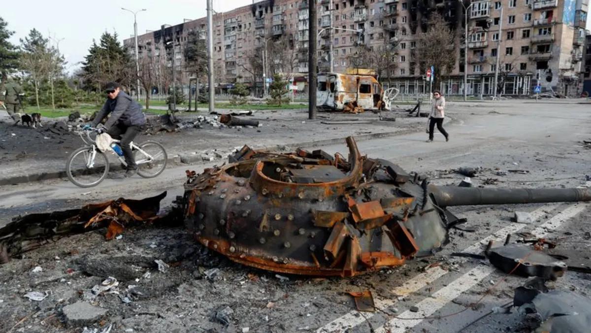 Explosions rock Ukraine, bodies line streets of Mariupol