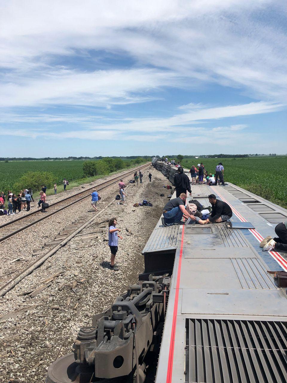 Three killed, dozens hurt as US train derails after hitting truck  