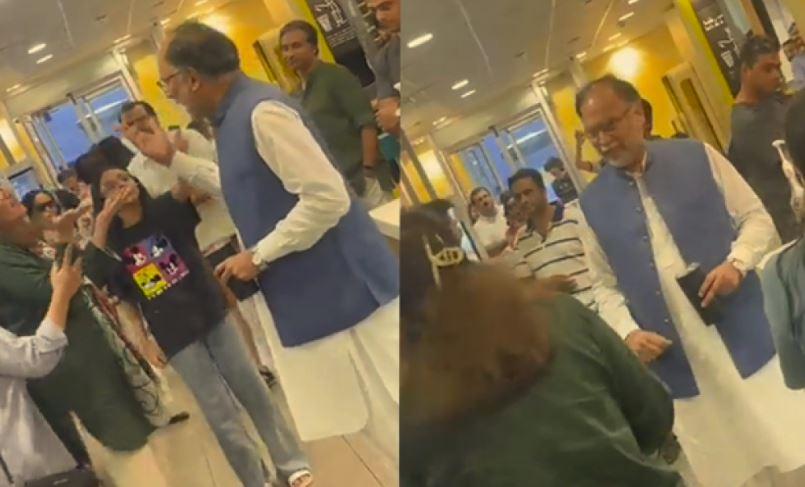 Family jeers PML-N's Ahsan Iqbal on his arrival at Bhera eatery