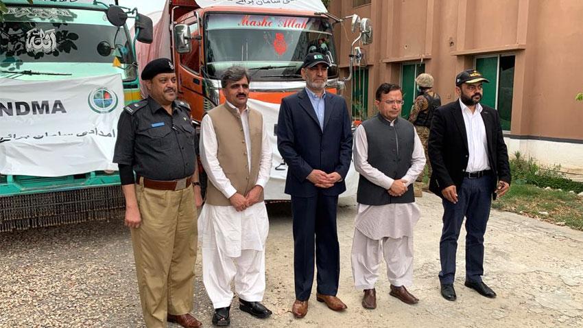 Chairman NDMA hands over relief goods, cheques among KP rain affectees