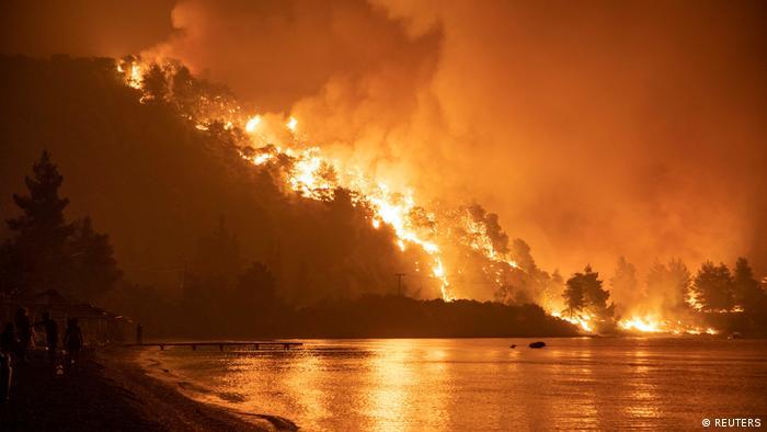 Thousands evacuated as massive wildfires continue to rip through Greece