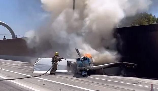 Plane crash-lands on US highway; bursts into flames  