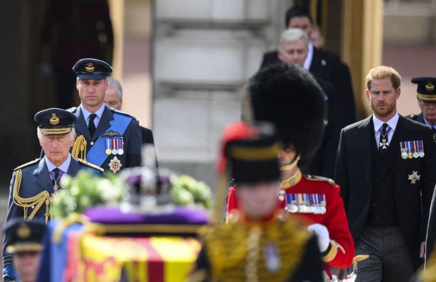 King Charles, sons follow coffin for queen's last journey from palace