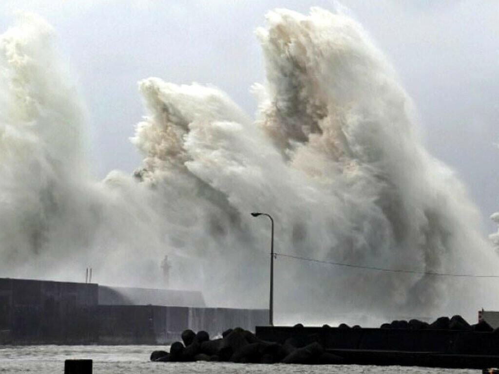 Typhoon lashes central Japan killing two