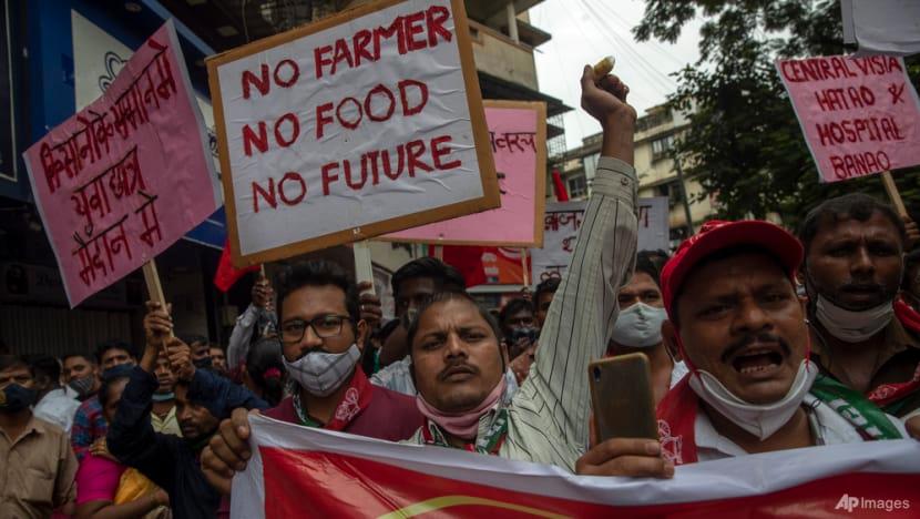 Indian farmers block roads and railway tracks outside New Delhi, call for nationwide strike