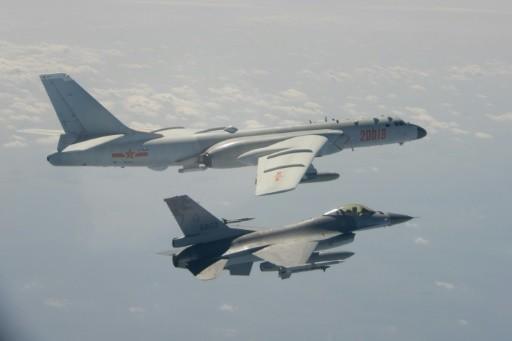 Tensions heighten as China sends another 56 jets into Taiwan defence zone