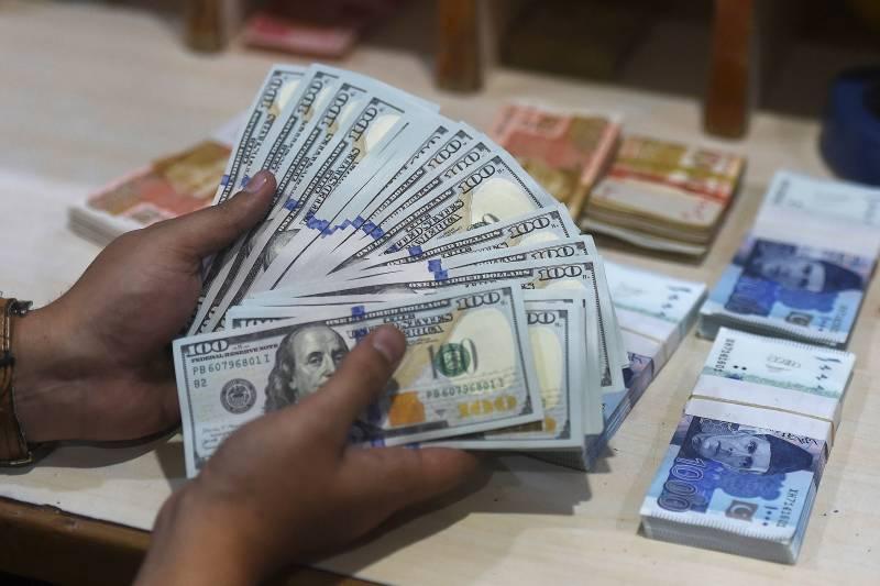 US dollar gains more value against PKR in interbank