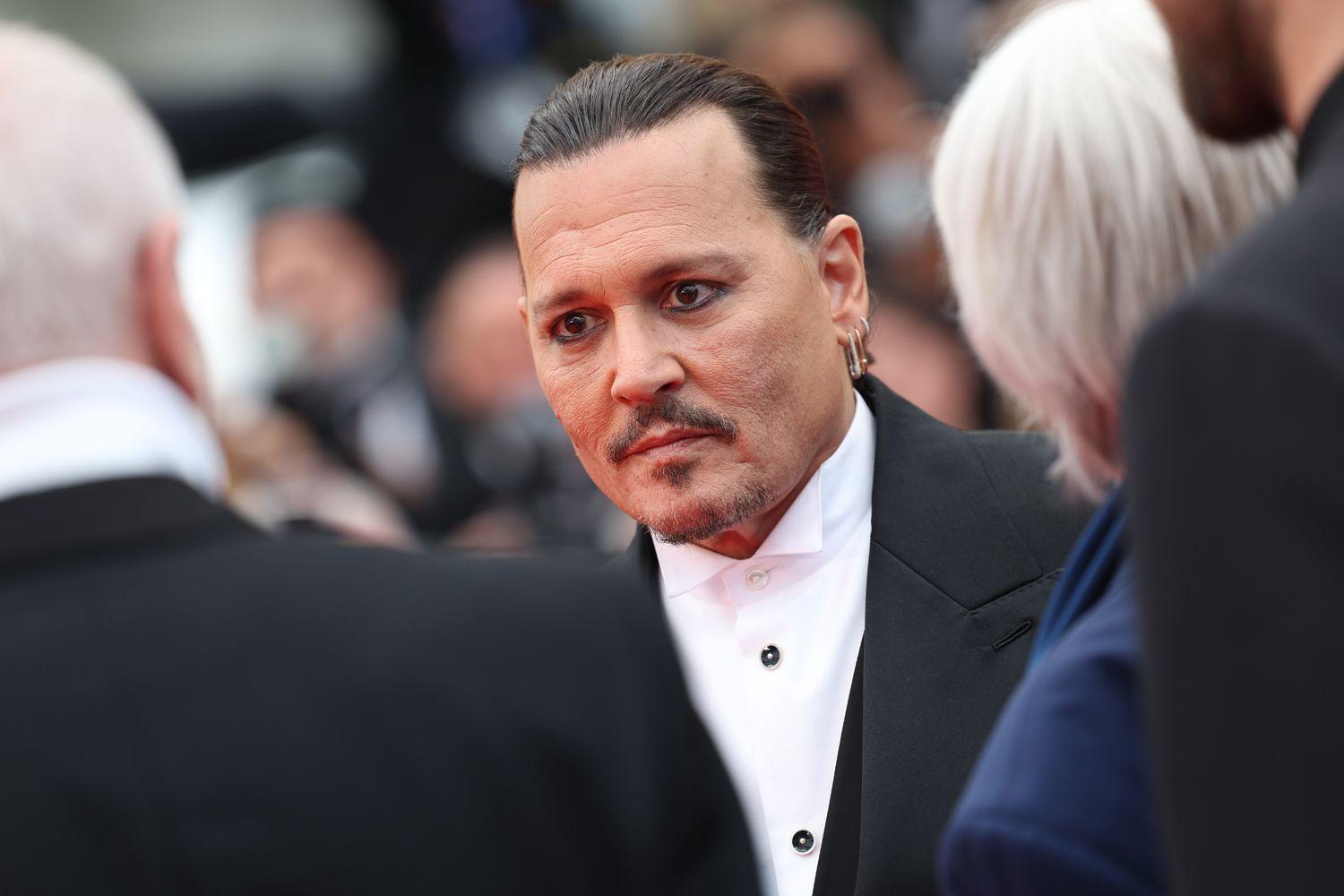 Johnny Depp gets emotional at Cannes premiere