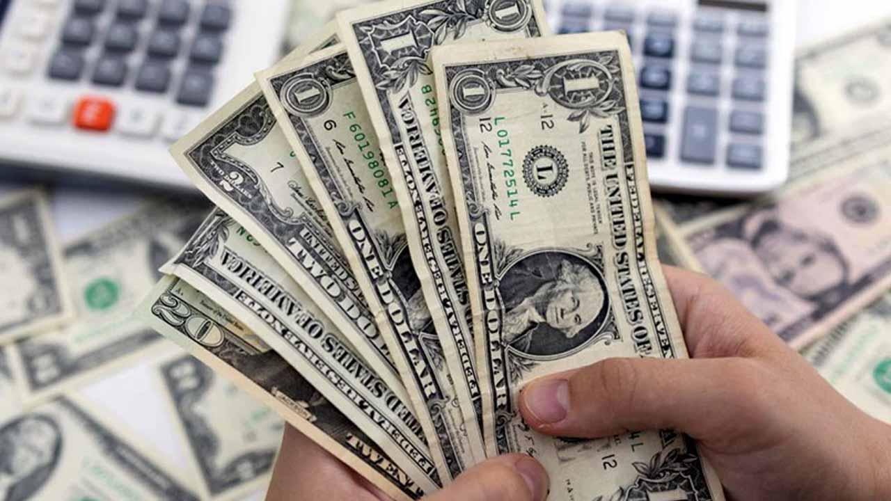 Dollar slightly drops against rupee