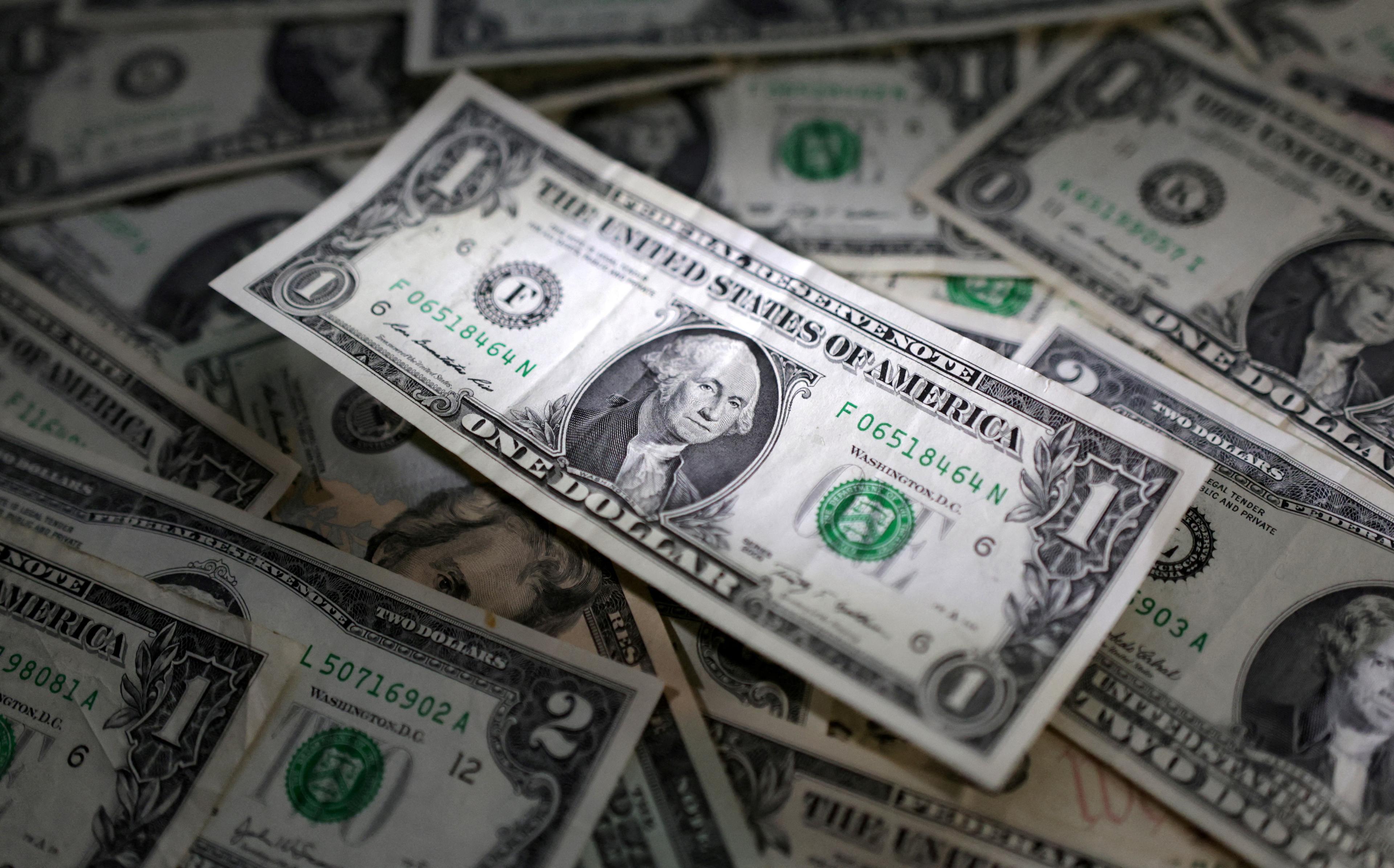 US dollar gains after relatively strong data