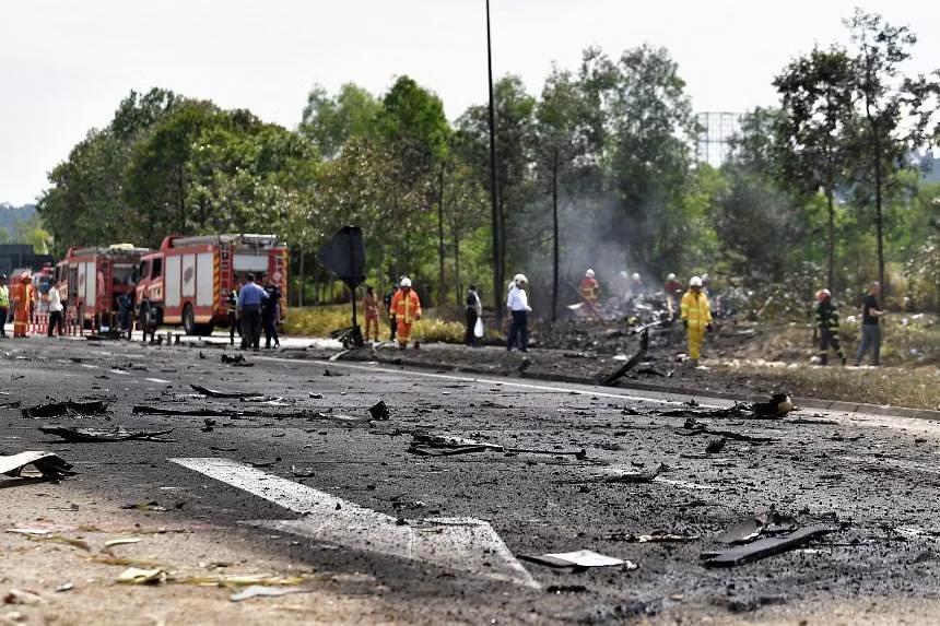 Private jet crashes into motorbike and car in Malaysia, kills 10