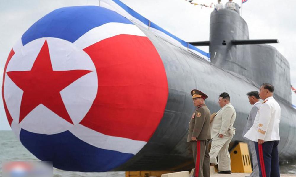 North Korea unveils nuclear-capable submarine