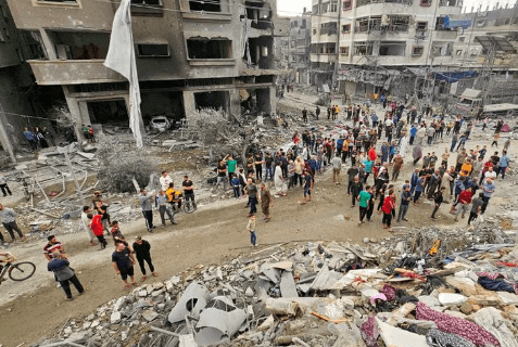 Gaza at war: Palestinians dig mass grave inside ‘encircled’ hospital