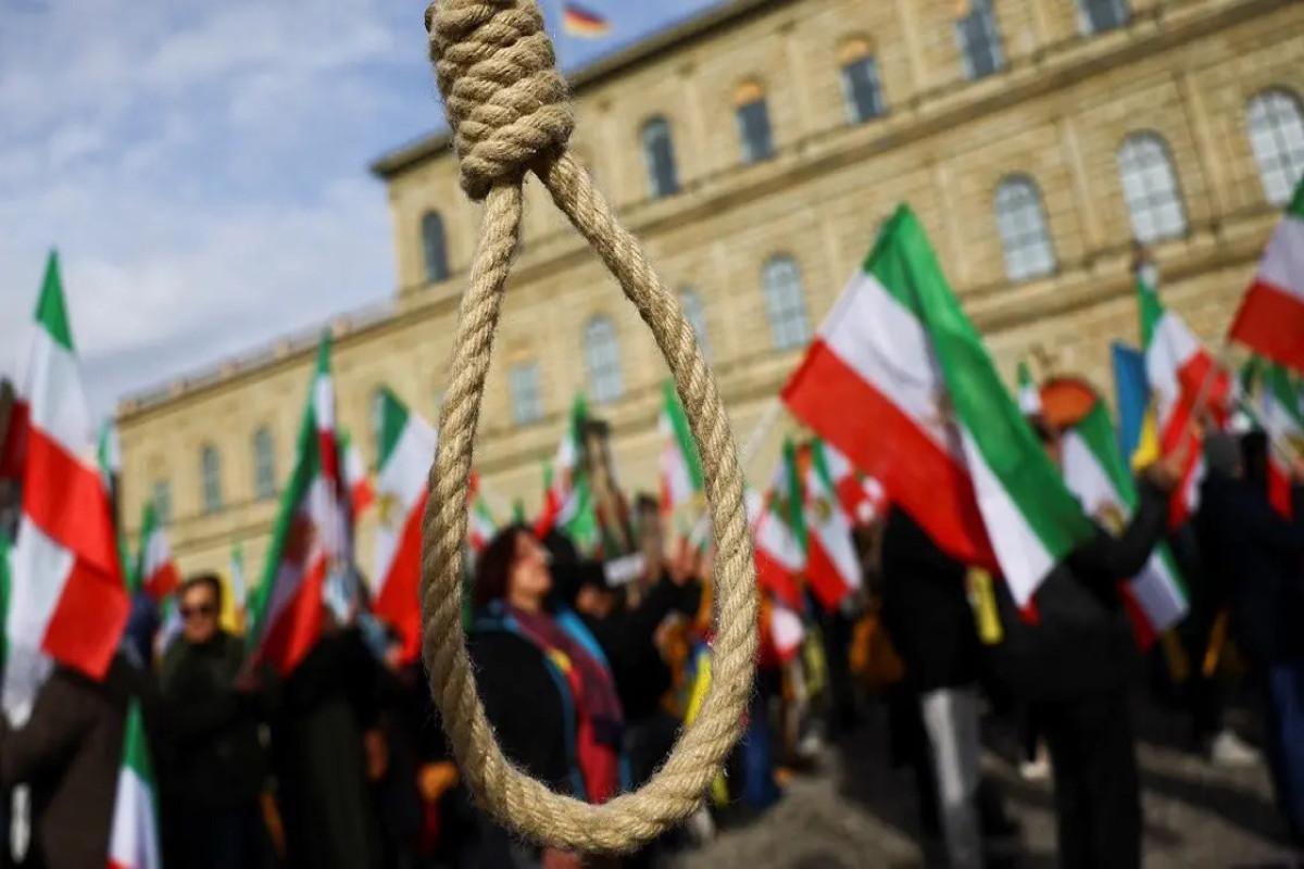Iran hangs two men for blasphemy