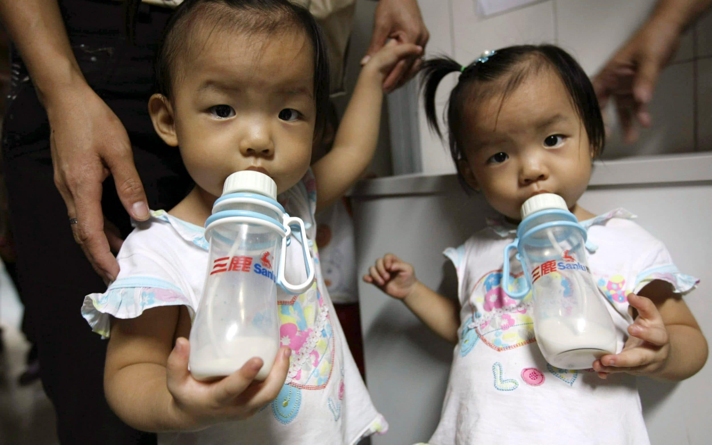 China formally passes three-child policy into law