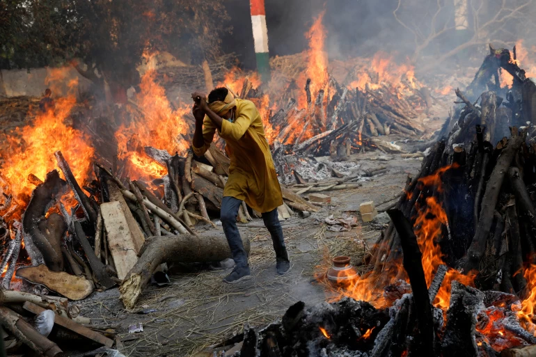 Mass funeral pyres reflect India's COVID crisis, Delhi gets requests to cut down city parks