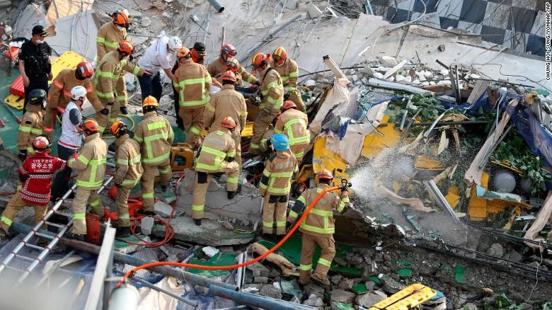 South Korea building collapses onto bus during demolition, kills nine