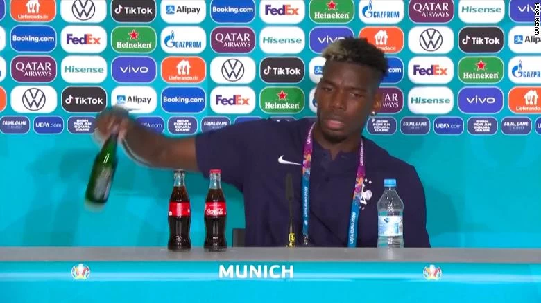 Following Ronaldo's lead, Paul Pogba too removes display drink during presser