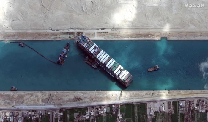 Stranded container ship in Suez Canal reported freed